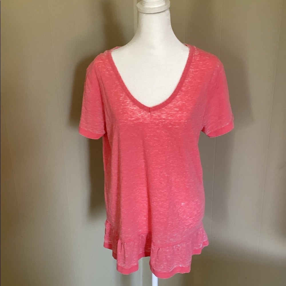 Shirt that has a shelf at bottom